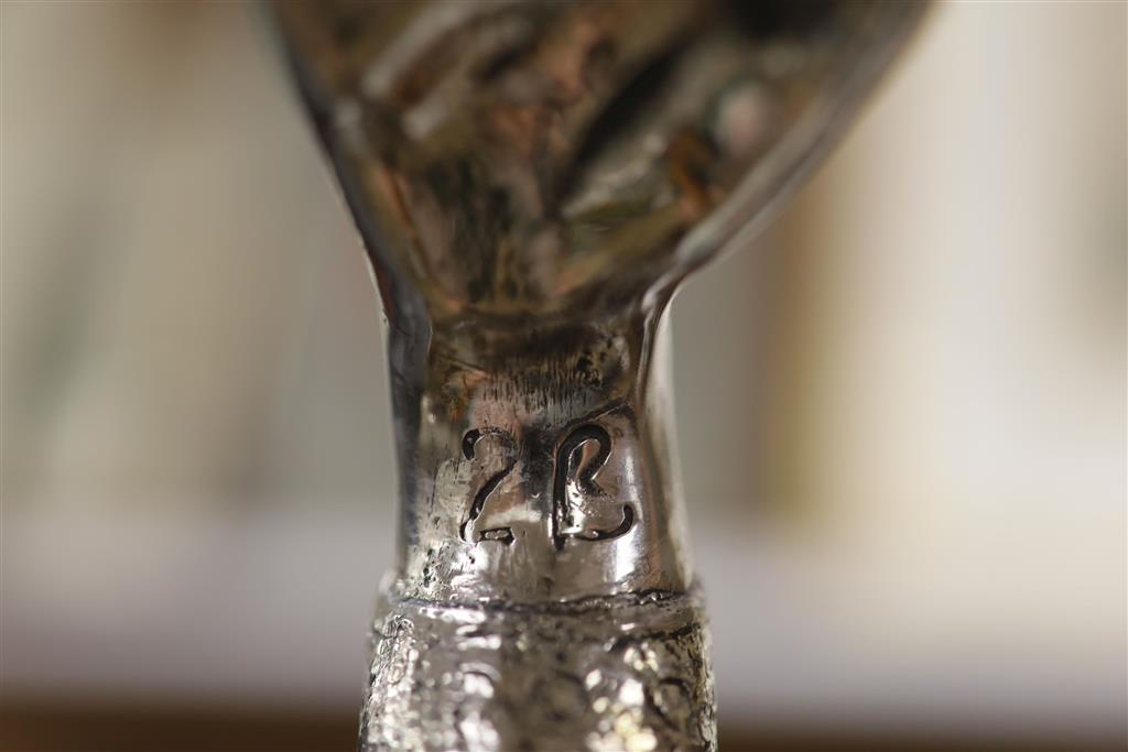 A Chinese silver-mounted malacca cane and a plate mounted ebonised stick
